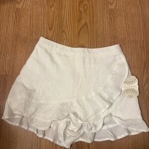 White Ruffle Hem Shorts